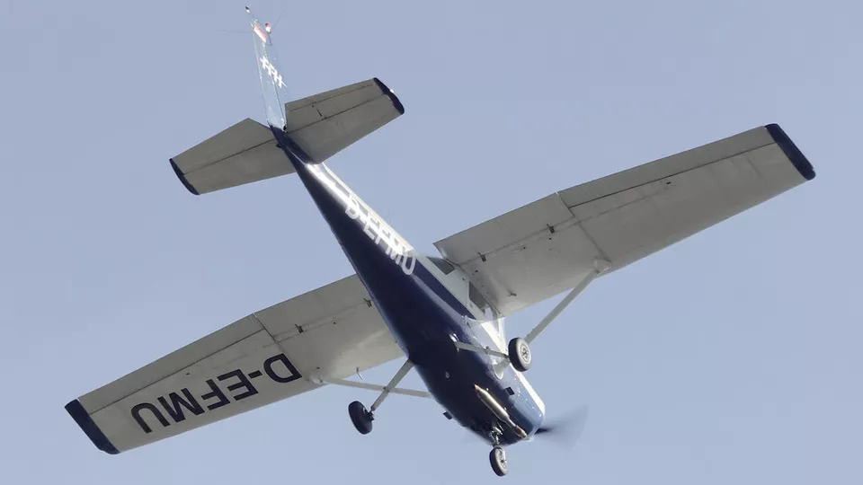 Cessna 152 training aircraft in flight